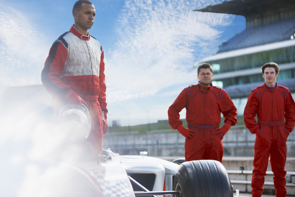 Race team around car on track